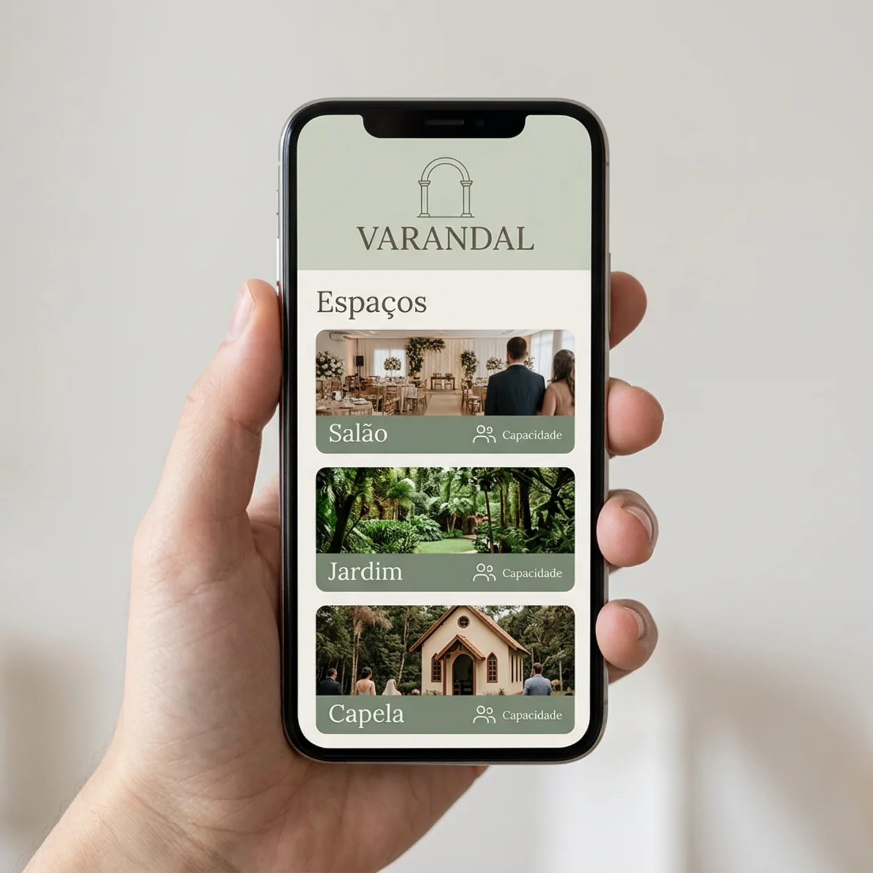 Telemóvel com a página de espaços e capacidade de uma quinta de eventos Telemóvel com a página de espaços e capacidade de uma quinta de eventos